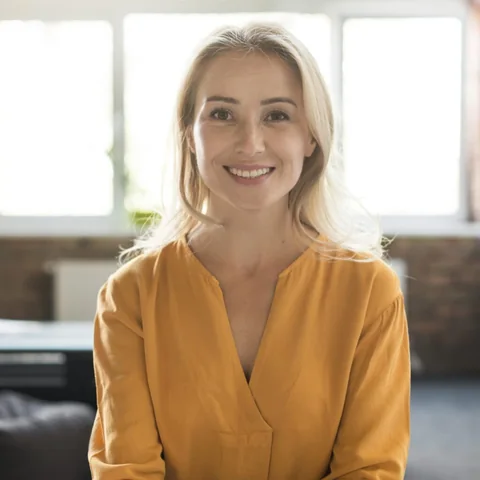Smiling adult, an illustration of who BreathiZen is made for